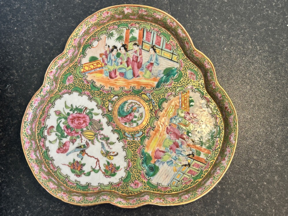 A 19th-century Chinese Canton trefoil porcelain dish decorated with polychrome enamel panels of figures, birds, butterflies, and floral motifs surrounded by gilded borders. View III