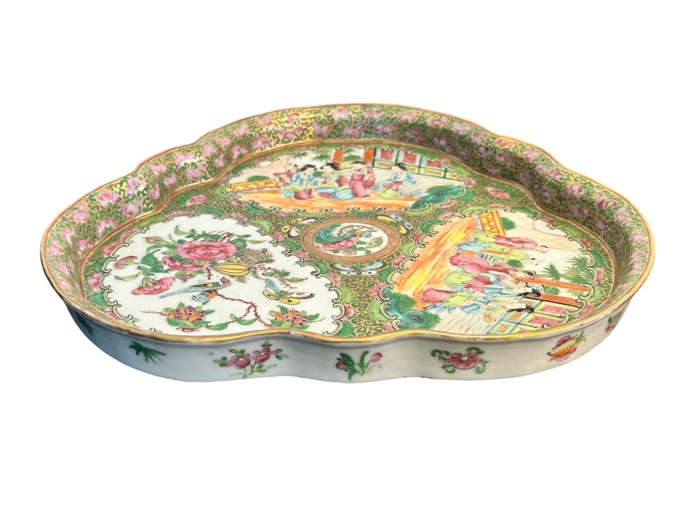 A 19th-century Chinese Canton trefoil porcelain dish decorated with polychrome enamel panels of figures, birds, butterflies, and floral motifs surrounded by gilded borders. View IV