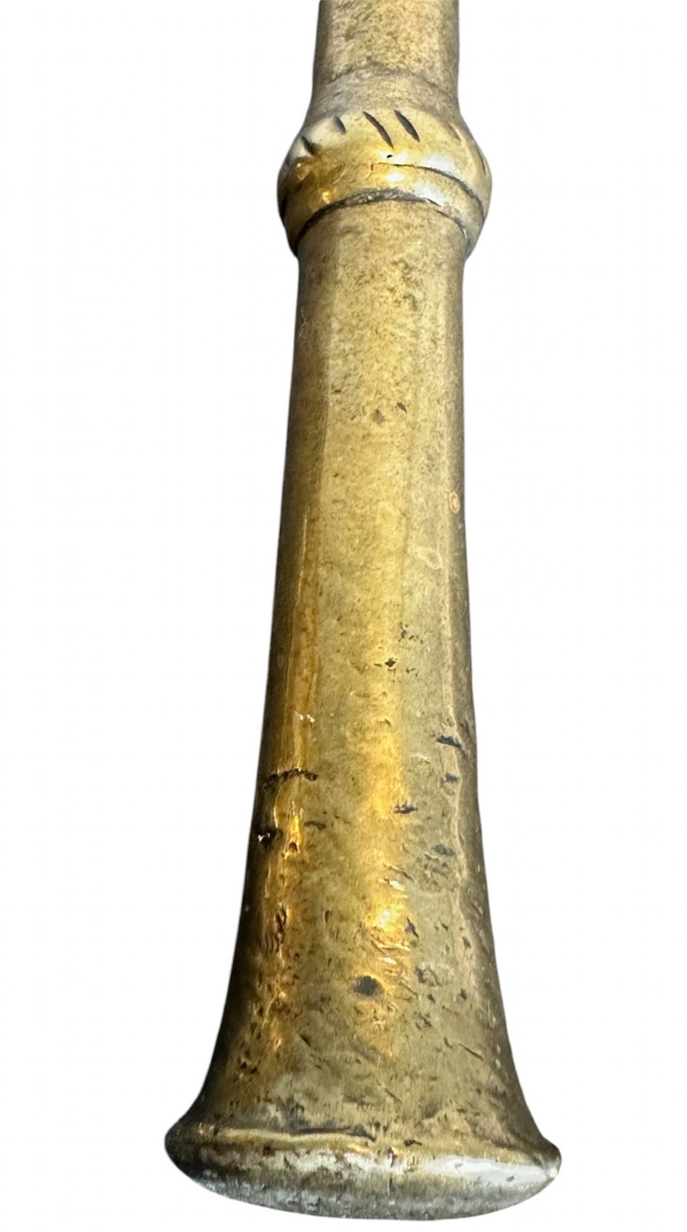 An eighteenth-century cast brass pestle and mortar featuring diagonal carved fluting around the main bowl and a flared rim. View V