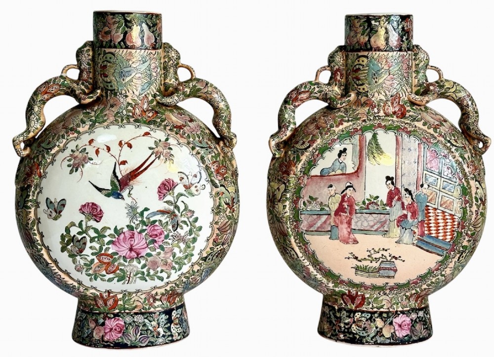 A pair of Chinese Famille Rose porcelain moon flasks featuring circular reserves with painted bird, floral, and figure scenes surrounded by dense enamel borders and dragons.