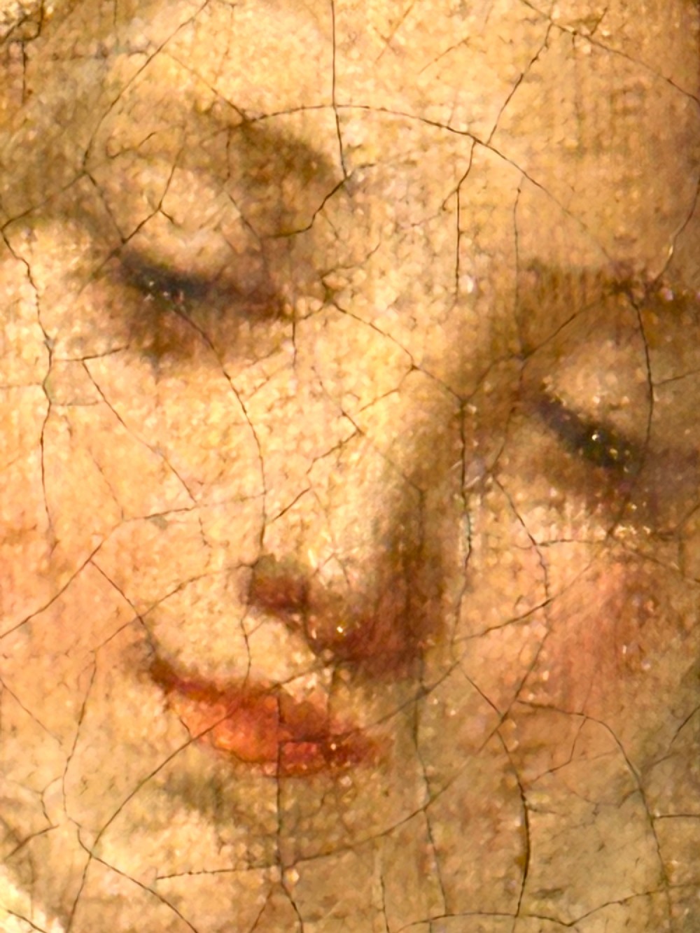 An 18th-century oil painting on canvas depicting two women in period costume within an oval painted border, housed in a carved gilded frame. View IV
