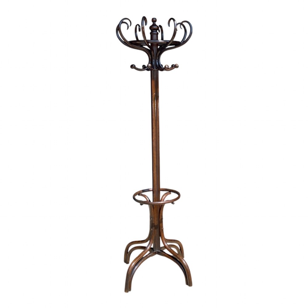 A tall dark brown bentwood coat and hat stand featuring double curved hooks, a central turned column, an umbrella drip ring, and splayed legs.