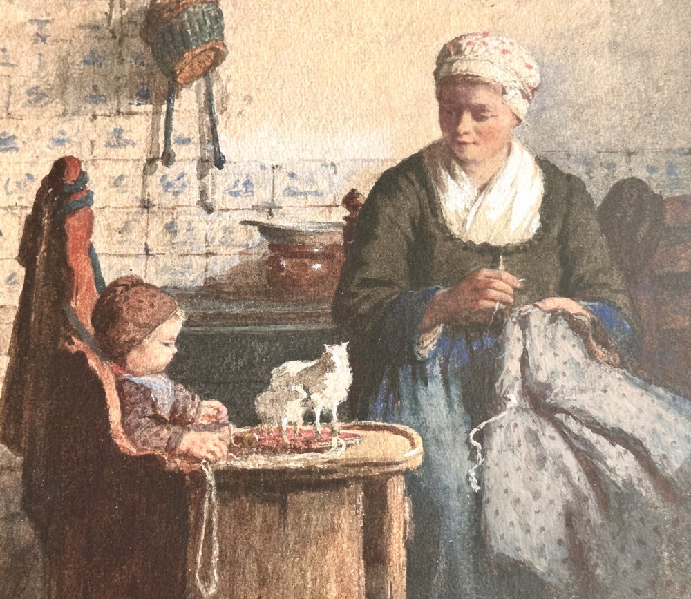 A framed 19th-century watercolour painting depicting a woman seated beside a child in a traditional Dutch kitchen interior with a tiled fireplace. View IV