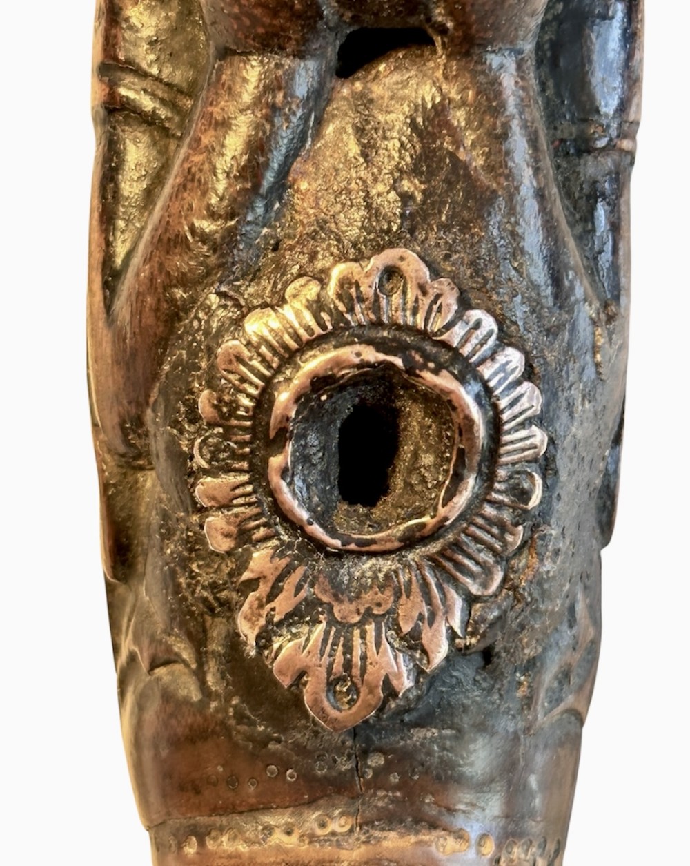 A dark brown carved bamboo smoking pipe shaped into a figurative human form along the bowl with a tapered bamboo stem. View VII