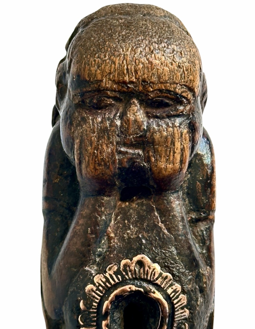 A dark brown carved bamboo smoking pipe shaped into a figurative human form along the bowl with a tapered bamboo stem. View XIII