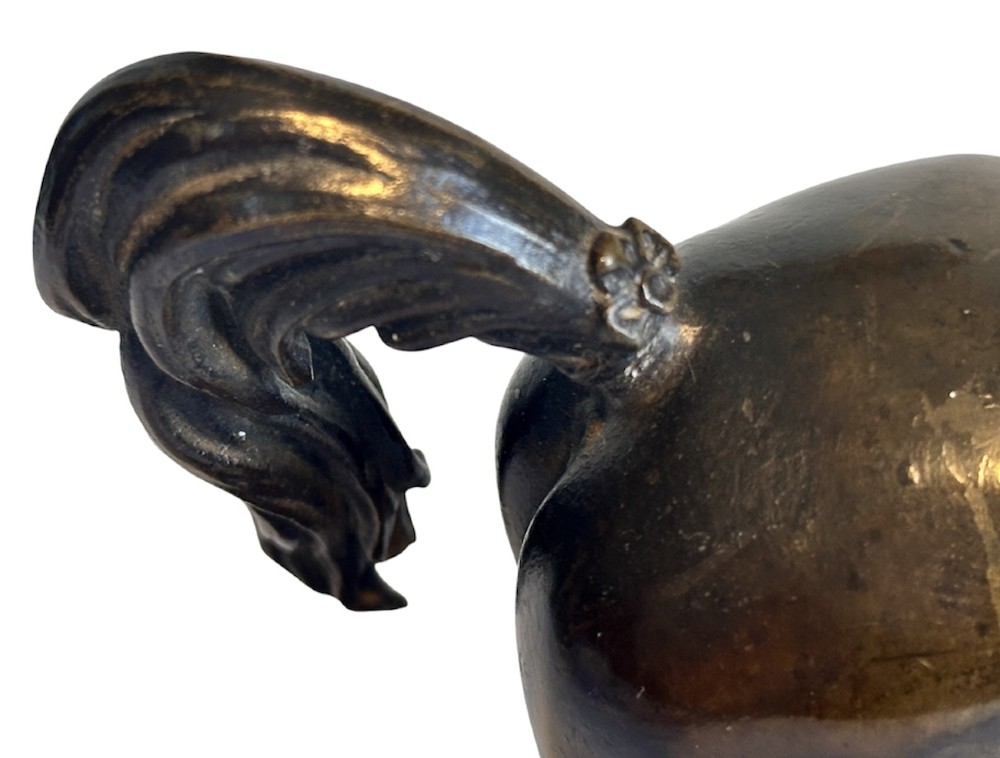 A dark patinated bronze sculpture of a trotting stallion mounted on a rectangular veined red marble plinth. View VIII