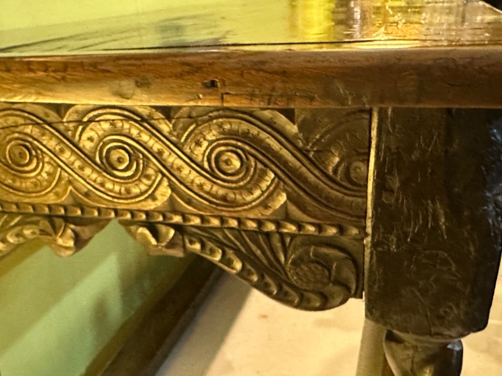 An 18th-century dark oak refectory table featuring carved apron details, spiral barley twist legs, and a perimeter stretcher base. View X