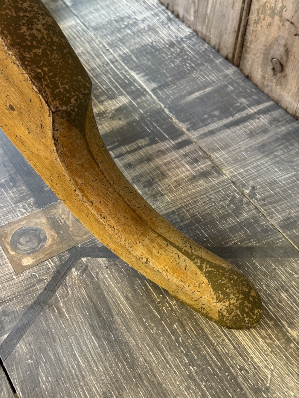 A Victorian three-tier wooden pedestal table with a painted finish, turned central stem, starburst motif, and tripod feet. View IX