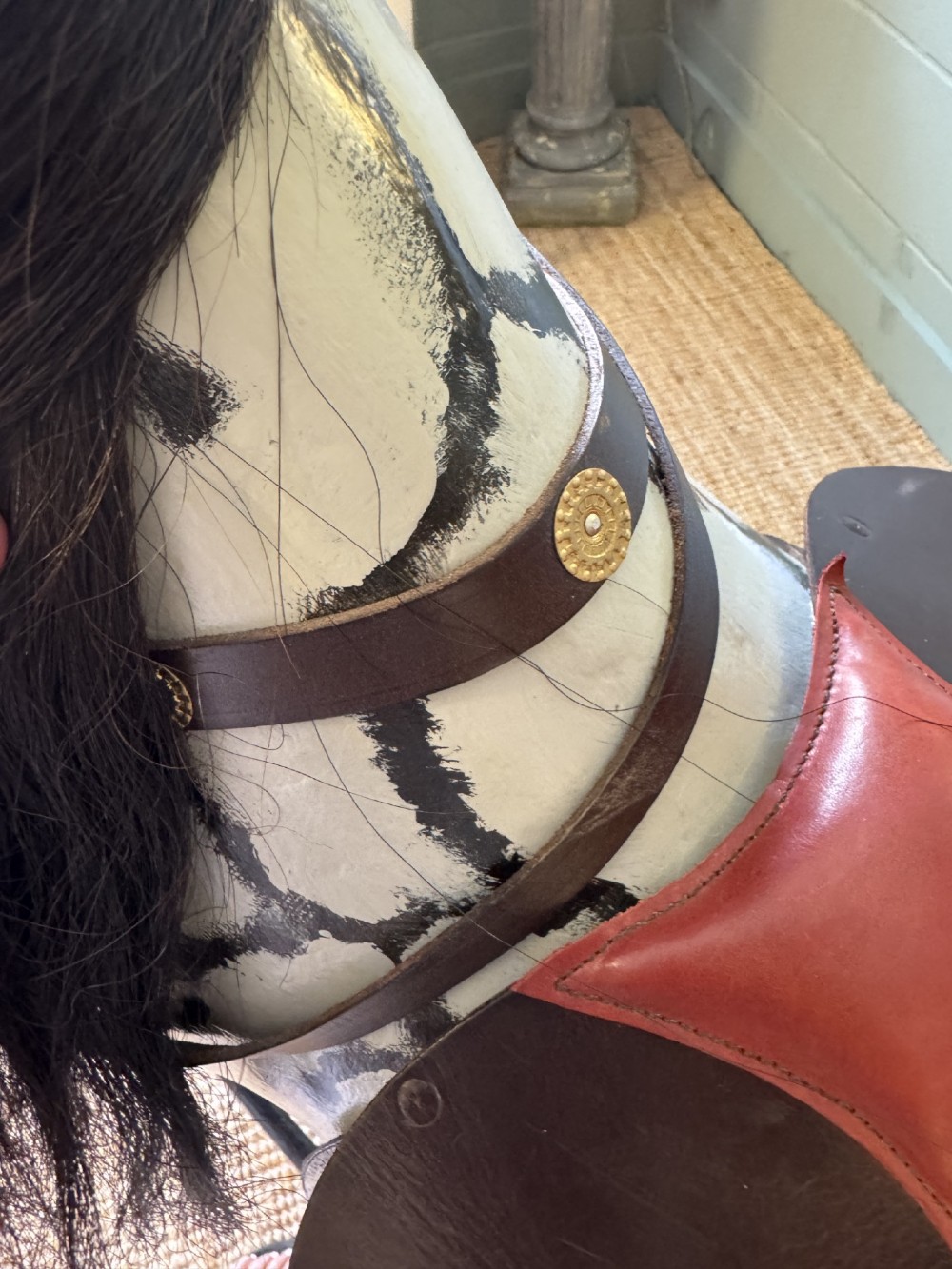 An Edwardian carved wooden dapple grey rocking horse with real horsehair and leather saddle, mounted on a black painted wooden bow rocker. View VIII