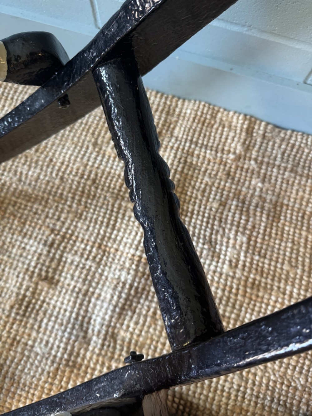 An Edwardian carved wooden dapple grey rocking horse with real horsehair and leather saddle, mounted on a black painted wooden bow rocker. View XIII