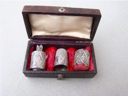 fig 1. EARLY VICTORIAN SILVER THIMBLE, TAPE MEASURE & PIN CUSHION TRIO, IN PRESENTATION CASE, CIRCA 1840