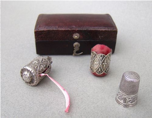 fig 2. EARLY VICTORIAN SILVER THIMBLE, TAPE MEASURE & PIN CUSHION TRIO, IN PRESENTATION CASE, CIRCA 1840