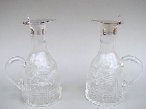 fig 1. PAIR OF SILVER MOUNTED WHISKY TOTS BY LEVI & SALAMAN, BIRMINGHAM 1926