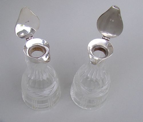 fig 2. PAIR OF SILVER MOUNTED WHISKY TOTS BY LEVI & SALAMAN, BIRMINGHAM 1926