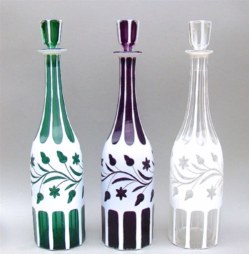 fig 3. SET OF THREE 19TH C. BOHEMIAN GLASS DECANTERS WITH SILVER PLATED STAND, CIRCA 1890