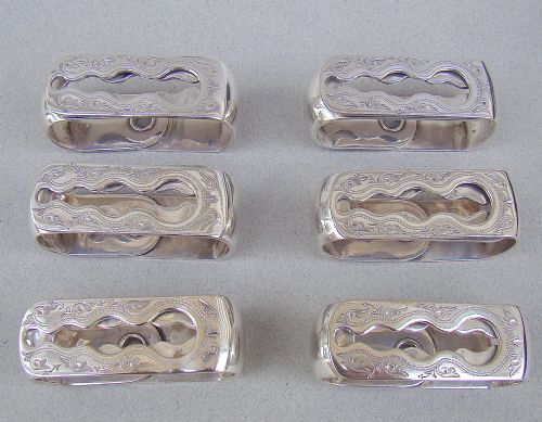 fig 1. CASED SET OF SIX VICTORIAN SILVER PLATED NUMBERED NAPKIN RINGS, CIRCA 1870