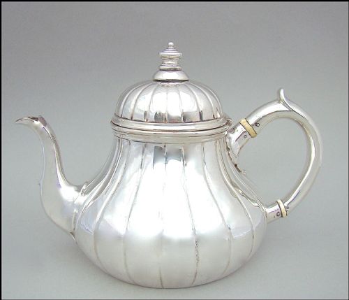 fig 1. MID VICTORIAN SOLID SILVER TEAPOT BY ROBERT GARRARD II, LONDON 1870