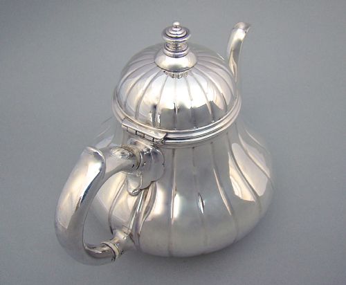 fig 2. MID VICTORIAN SOLID SILVER TEAPOT BY ROBERT GARRARD II, LONDON 1870