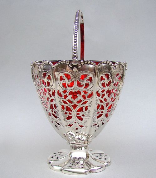 fig 1. LARGE VICTORIAN SILVER SUGAR BASKET BY HENRY WILKINSON, SHEFFIELD 1861