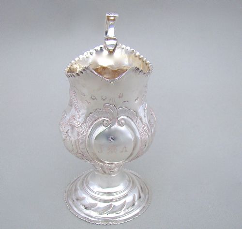 fig 2. GEORGIAN SILVER CREAM JUG, LONDON 1776