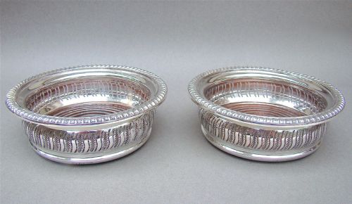 Superb Pair of Mid 20th Century Solid Silver Wine Coasters by Mappin & Webb, Birmingham 1968.
