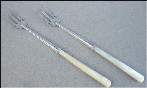 fig 1. CASED PAIR OF GEORGE V SILVER PICKLE FORKS BY ADIE & LOVEKIN, BIRMINGHAM 1912
