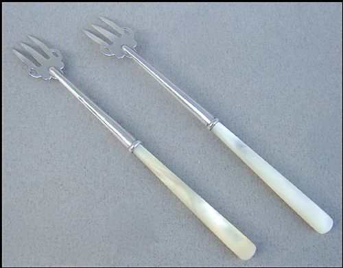 fig 2. CASED PAIR OF GEORGE V SILVER PICKLE FORKS BY ADIE & LOVEKIN, BIRMINGHAM 1912