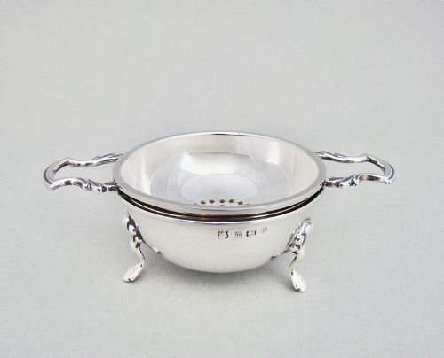 fig 1. GEORGE V SILVER TEA STRAINER & STAND BY THE BARKER BROTHERS, BIRMINGHAM 1929