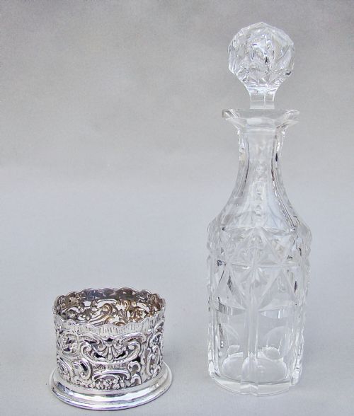 fig 1. EDWARDIAN SILVER CONDIMENT COASTER WITH SLICED-CUT CRYSTAL CONDIMENT BOTTLE, BIRMINGHAM 1901
