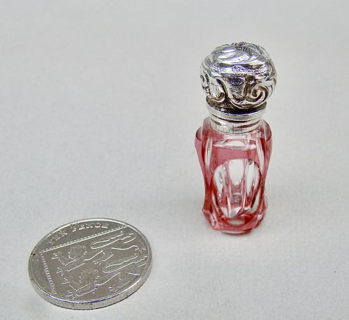 fig 1. MINIATURE VICTORIAN SILVER & OVERLAY CRANBERRY GLASS SCENT BOTTLE, CIRCA 1890