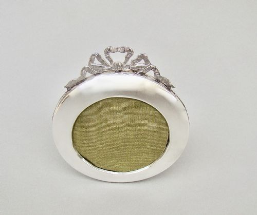 fig 2. DELIGHTFUL GEORGE V SILVER RIBBON PHOTO FRAME BY JESSE EARL, LONDON 1920