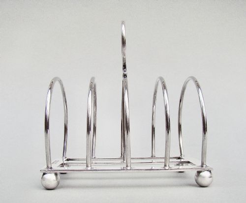 fig 1. GOOD EDWARDIAN SILVER TOAST RACK BY THE ATKINS BROTHERS, SHEFFIELD 1904