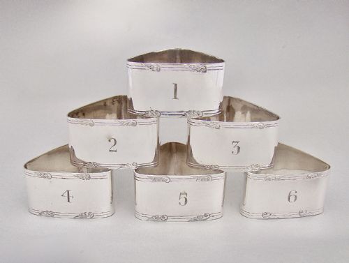 fig 2. SET OF SIX EDWARDIAN SILVER PLATED NUMBERED NAPKIN RINGS, CIRCA 1900