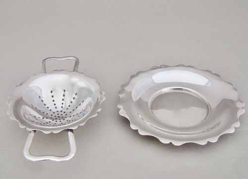 fig 2. GEORGE VI SILVER TEA STRAINER & STAND BY E. J. HOULSTON, BIRMINGHAM 1944