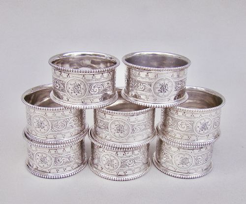 fig 2. CASED SET OF EIGHT VICTORIAN SILVER PLATED NUMBERED NAPKIN RINGS, CIRCA 1880