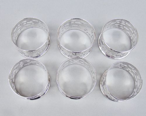 fig 3. MATCHED CASED SET OF SIX EDWARDIAN SOLID SILVER NAPKIN RINGS BY BROADWAY & CO, BIRMINGHAM CIRCA 1910