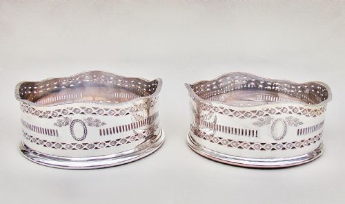 fig 1. PAIR OF EARLY VICTORIAN SILVER PLATED WINE COASTERS, CIRCA 1840