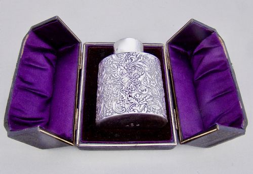 fig 1. CASED VICTORIAN SILVER TEA CADDY BY THE COOPER BROTHERS, BIRMINGHAM 1898