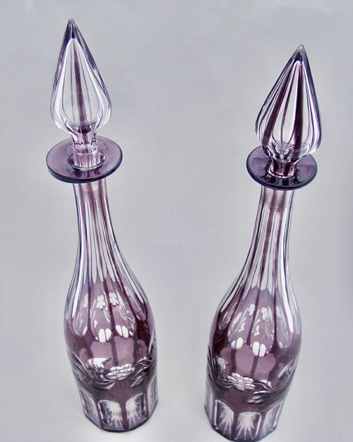 fig 1. ELEGANT PAIR OF BOHEMIAN AMETHYST GLASS DECANTERS, CIRCA 1890