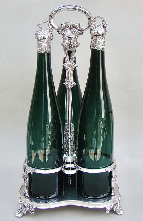 Set of Three Victorian Bristol Green Glass Decanter by Henry Wilkinson & Co, Birmingham 1839 in Their Original Silver Plated Stand