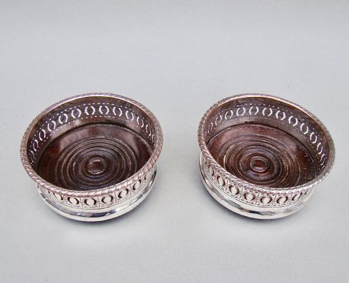 fig 1. PAIR OF EDWARDIAN SILVER PLATED CONDIMENT COASTERS, CIRCA 1910