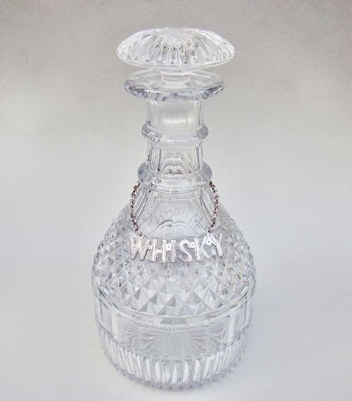 fig 1. SUPERB GEORGIAN CUT GLASS DECANTER WITH SILVER PLATED DECANTER LABEL FOR WHISKY
