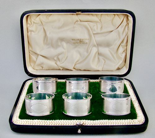 fig 3. FABULOUS CASED SET OF SIX EDWARDIAN SOLID SILVER NAPKIN RINGS BY WALKER & HALL, SHEFFIELD 1909
