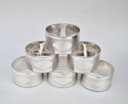 fig 2. FABULOUS CASED SET OF SIX EDWARDIAN SOLID SILVER NAPKIN RINGS BY WALKER & HALL, SHEFFIELD 1909