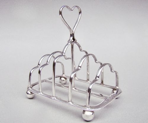 Victorian Novelty Silver Heart-shaped Handled Toast Rack by the Atkins Brothers, Sheffield 1895