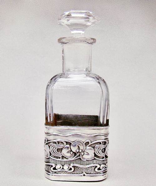 fig 1. ART NOUVEAU SILVER AND GLASS COLOGNE BOTTLE BY THE ATKINS BROTHERS, BIRMINGHAM 1905