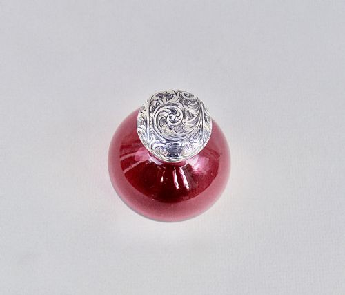 fig 2. SMALL AND EXQUISITE VICTORIAN SILVER AND CRANBERRY GLASS SCENT BOTTLE, CIRCA 1890