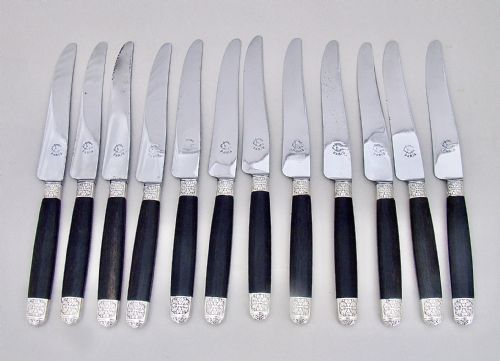 Fabulous Cased Set of Twelve Silver Plated French Table Knives with Ebony Handles and Steel Blades, Paris Circa 1890