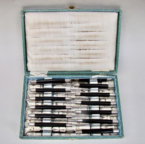 fig 2. FABULOUS CASED SET OF TWELVE SILVER PLATED FRENCH SMALL KNIVES WITH EBONY HANDLES AND STEEL BLADES, PARIS CIRCA 1890