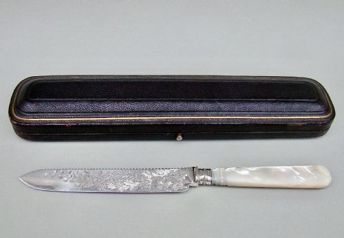 fig 1. CASED VICTORIAN SOLID SILVER AND MOTHER OF PEARL CAKE KNIFE BY THE ATKINS BROTHERS, SHEFFIELD 1892